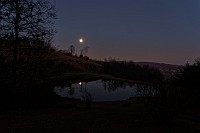 1st Full Moon of 2023 Rises Above Spring Pond